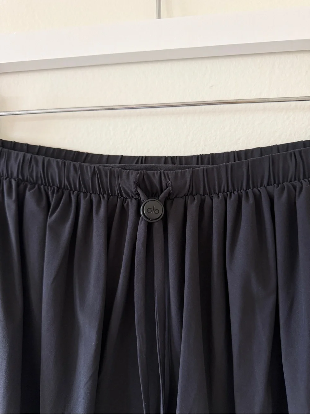 ALO Breezy Tennis Skirt in Black - XS